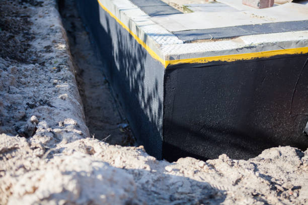 Professional Waterproofing technician working in Lodi, NY